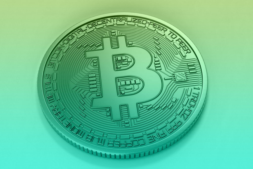 Stylized blue 'bitcoin' graphic, captioned 'Bitcoin Interest Rates Compared'